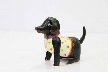 Hund schwarz sitzend klein 17x6x14 cm von Exner