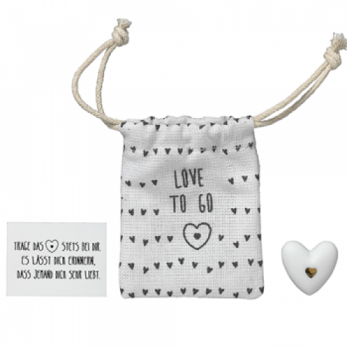 Herzstücke Kleine Tasche mit Herz Glücksbringer von Räder Design